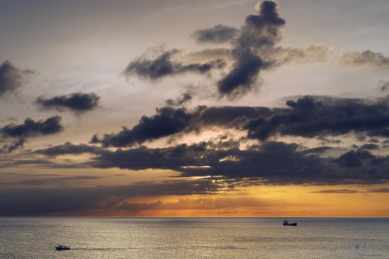 Freighter and Waterman's Boat on Carisle Bay from Needhams Point, Bridgetown, Barbados
