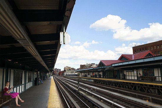 Woman in Pink Skirt with Cellphone on Marcy Avenue Station Platform, Williamsburg, New York City
