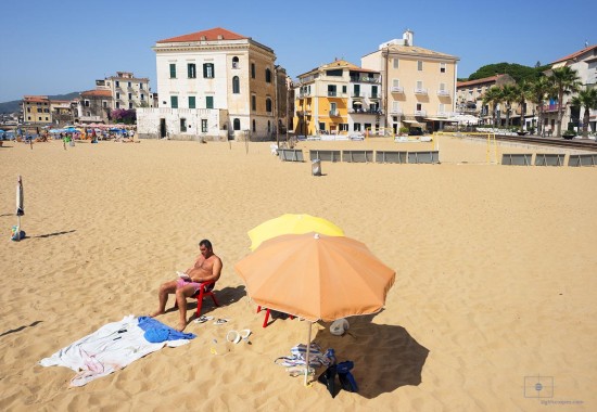 Man Reading at the Beach, Santa Maria di Castellabate, Italy Man Reading at the Beach, Santa Maria di Castellabate, Italy