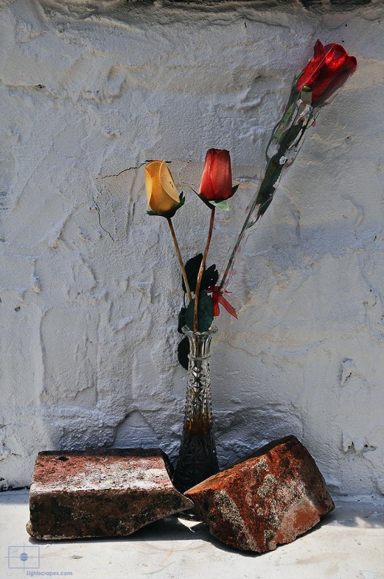 Cloth Roses in Glass Vase with Bricks, St. Louis Cemetery No 1, New Orleans