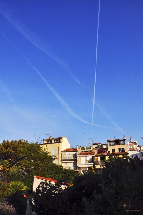 Rooftop Apartments, Birds, Jets Contrails at Early Morning, Antibes, France