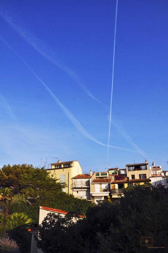 Rooftop Apartments, Birds, Jets Contrails at Early Morning, Antibes, France Rooftop Apartments, Birds, Jets Contrails at Early Morning, Antibes, France