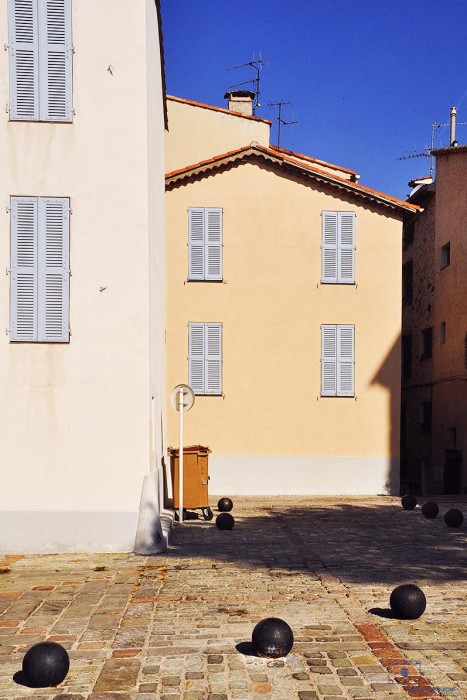 Buildings with Blue Shutters and Cannon Balls at Early Morning, Antibes, France