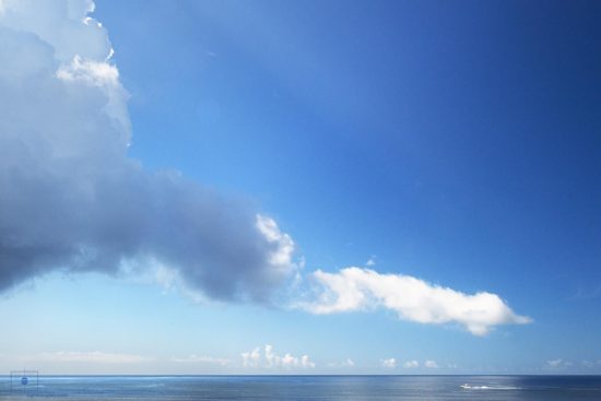 Fishing Boat and Clouds, Caswell Beach, Oak Island, North Carolina