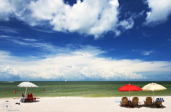 Family on the Beach and Umbrellas, Naples, Florida