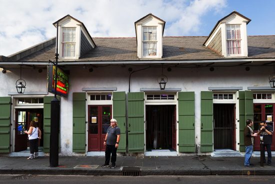 Man Standing Alone and Thinking on Bourbon Street, New Orleans, Louisiana