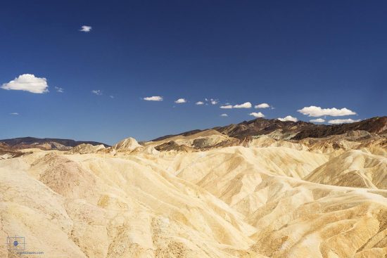 Badlands from Zabriskie Point, Death Valley, California Badlands Formations and Mountains from Zabriskie Point, Death Valley, California