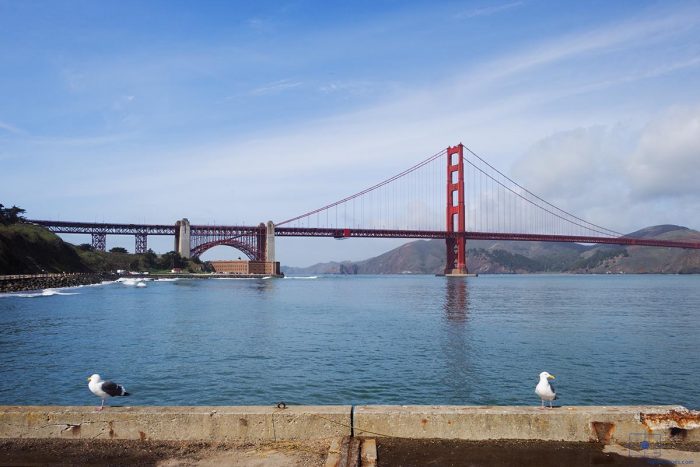 Golden Gate Bridge with San Francisco Bay and Seagulls on Torpedo Wharf, San Francisco, California
