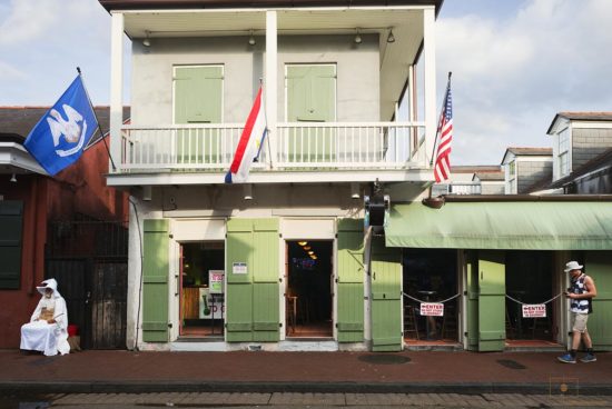 Bourbon Street, Louisiana – Gandalf and Flags Flags and Gandalf by Hand Grenade Bar on Bourbon Street, New Orleans, Louisiana