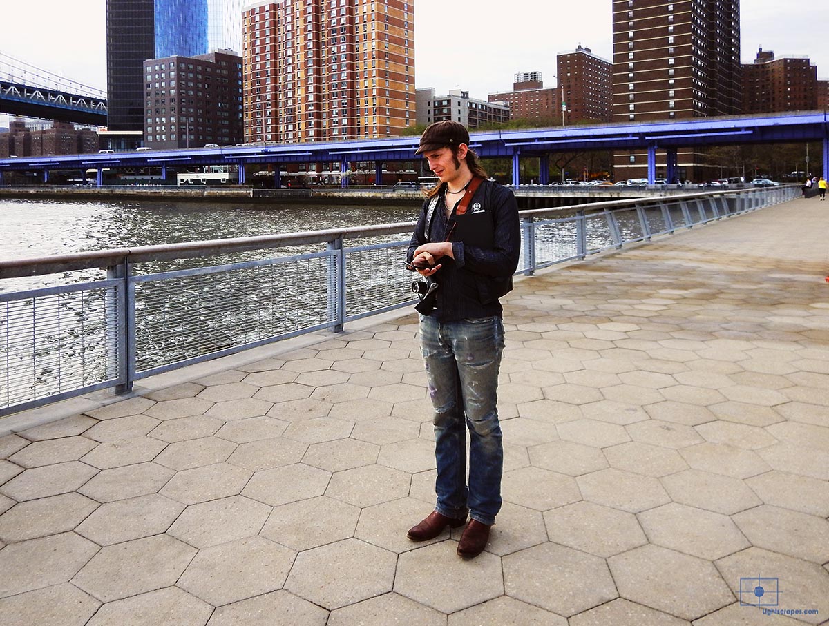 Street Photographer on Pier 35 and the East River-Manhattan, New York City